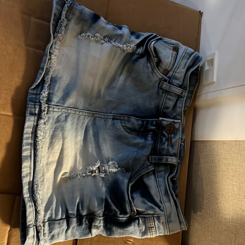 Distressed denim skirt